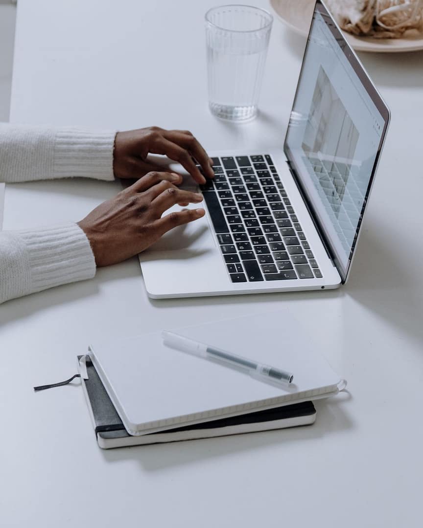 Khairul Umam Blog Image Shown Person Writing on Laptop